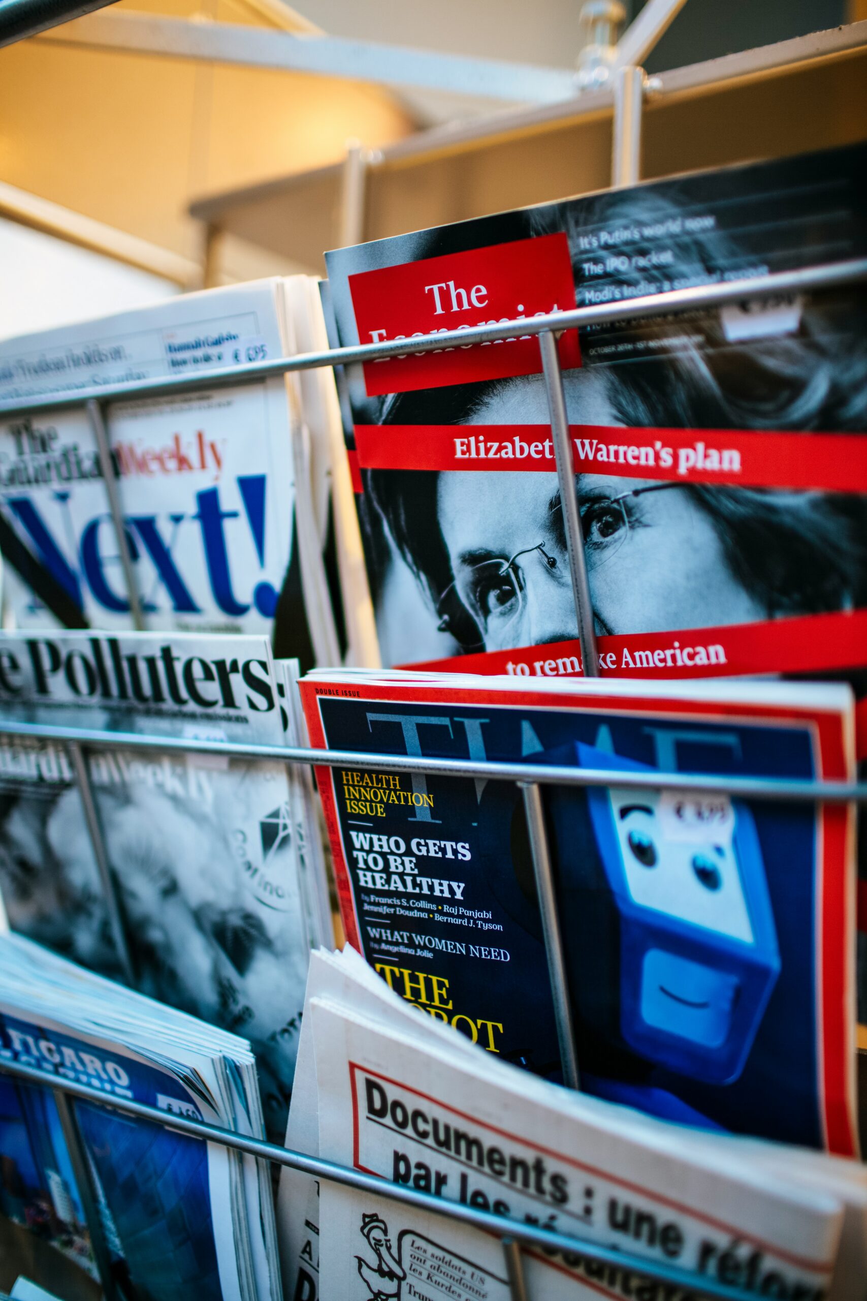 magazines displayed on a rack